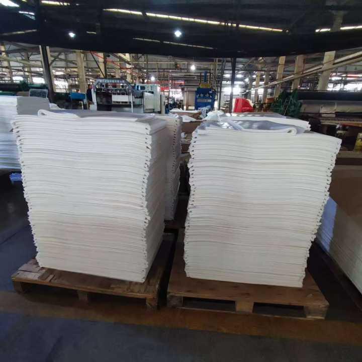 Super-calendered Tissue Paper